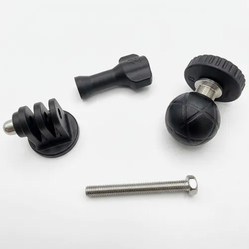 Четири компонента на адаптера, включително болтове и ball head.